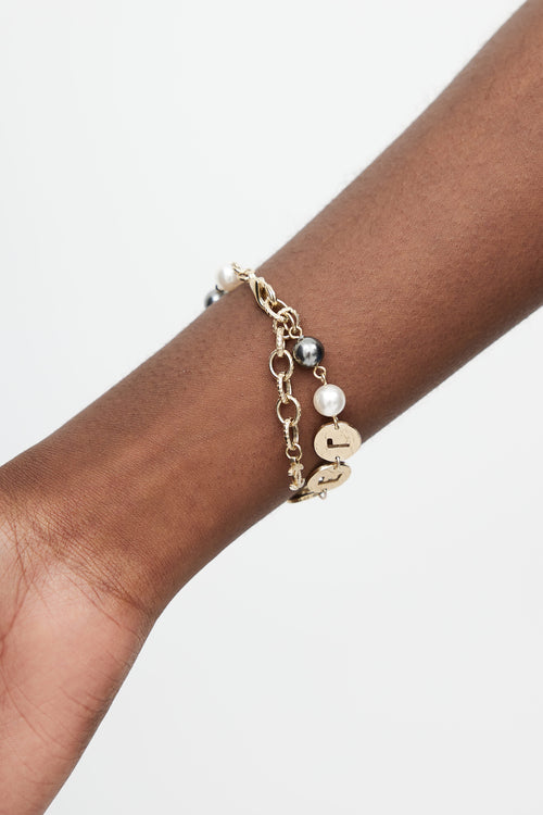 Chanel Gold 
Pearl Logo Bracelet