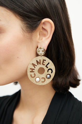 Chanel Gold 
Silver Papyrus Logo Earring