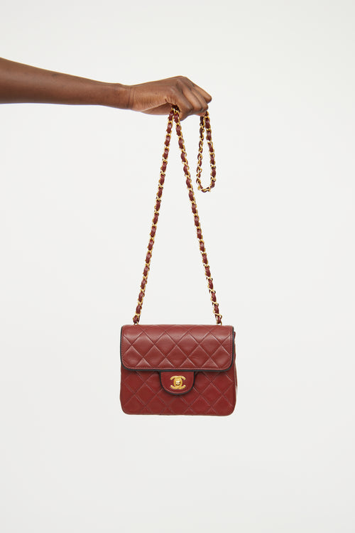 Chanel Burgundy 
Black Trim Flap Bag