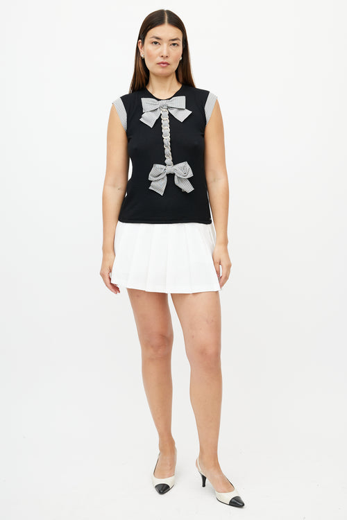 Chanel SS 2007 Black 
White Cashmere Bow Top