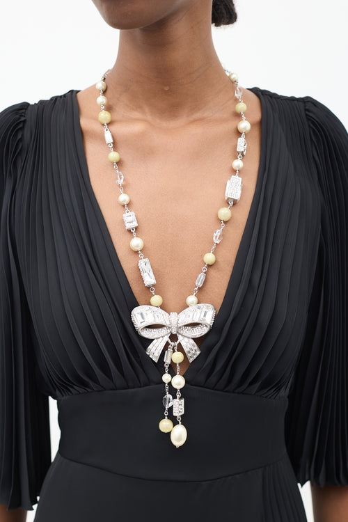 Chanel SS 2008 Silver 
Cream Pearl 
Crystal Bead Bow Necklace