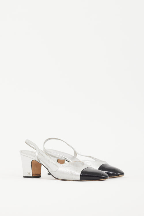 Chanel Silver Leather 
Black CC Slingback Pump