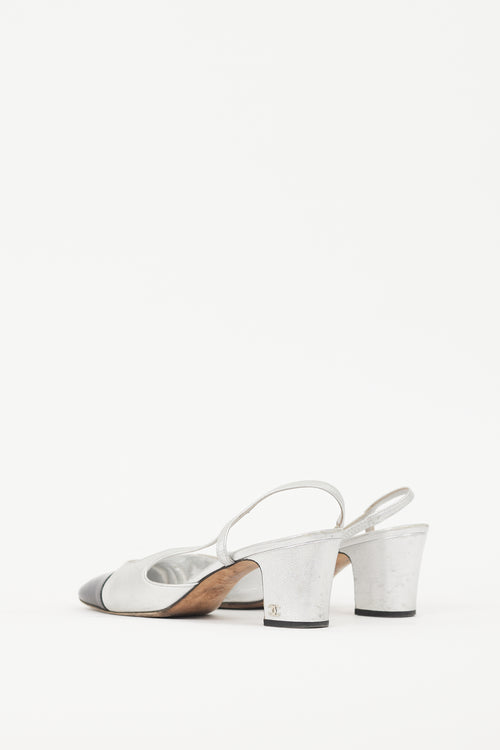 Chanel Silver Leather 
Black CC Slingback Pump