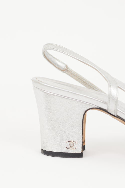 Chanel Silver Leather 
Black CC Slingback Pump