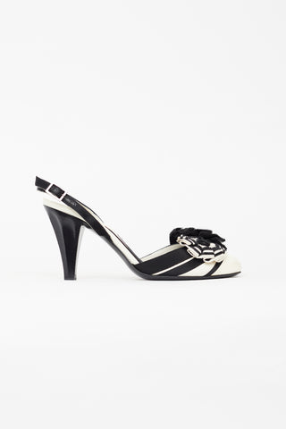 Chanel Vintage Black 
White Canvas Camellia Heel