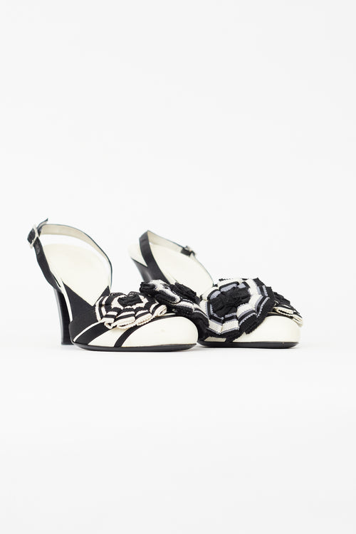 Chanel Vintage Black 
White Canvas Camellia Heel