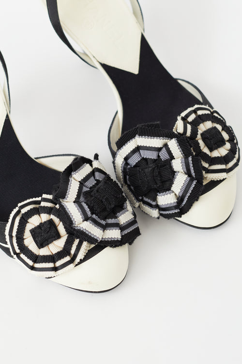 Chanel Vintage Black 
White Canvas Camellia Heel