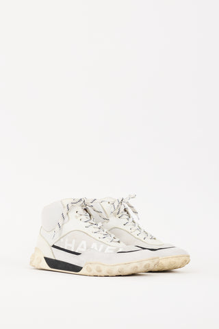 Chanel White CC Logo High Top Sneaker