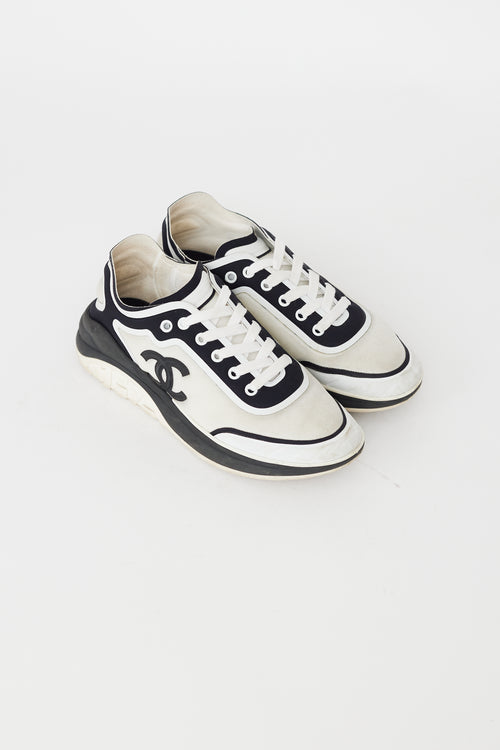 Chanel White 
Black Mesh Lycra Thermoplastic Sneaker