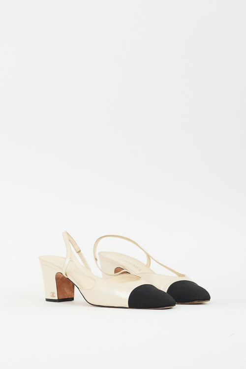 Chanel Cream Leather 
Black CC Slingback Pump