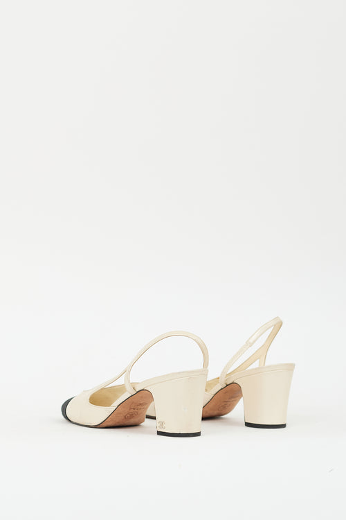 Chanel Cream Leather 
Black CC Slingback Pump