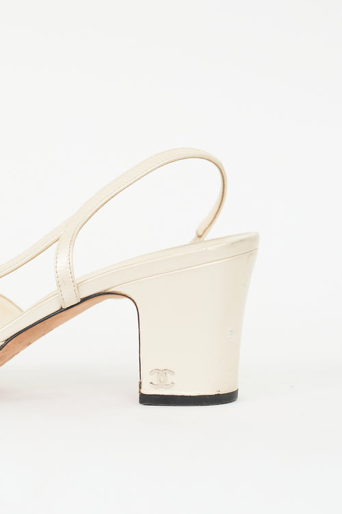 Chanel Cream Leather 
Black CC Slingback Pump