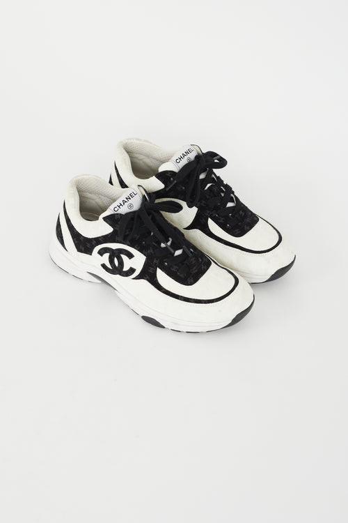 Chanel Black 
White CC Embossed Logo Sneaker