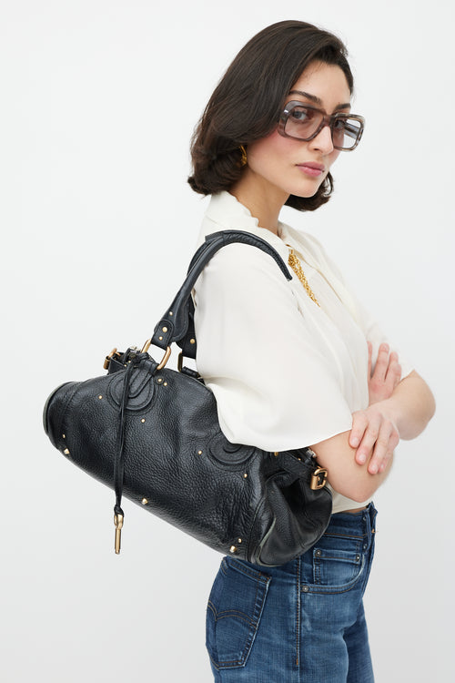 Chloé Black 
Gold Leather Paddington Bag