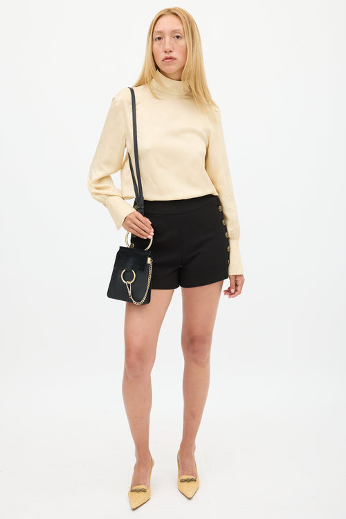 Chloé Black Leather 
Suede Faye Bracelet Bag