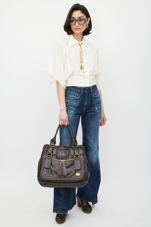 Chloé Brown 
Gold Leather Bay Bag