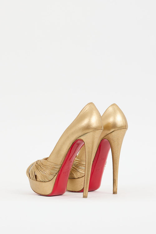 Christian Louboutin Gold Leather Aborina Pump