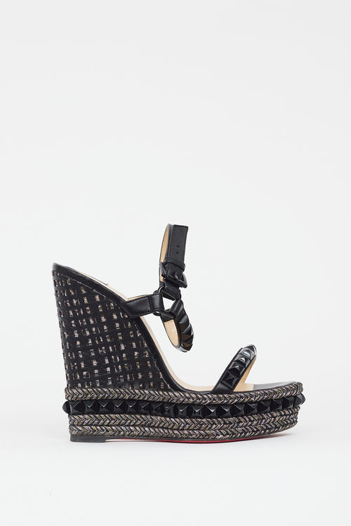 Christian Louboutin Black 
Gold Cataclou Studded Metallic Wedge Sandal