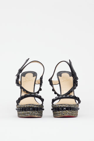 Christian Louboutin Black 
Gold Cataclou Studded Metallic Wedge Sandal