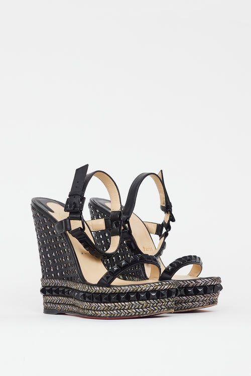 Christian Louboutin Black 
Gold Cataclou Studded Metallic Wedge Sandal