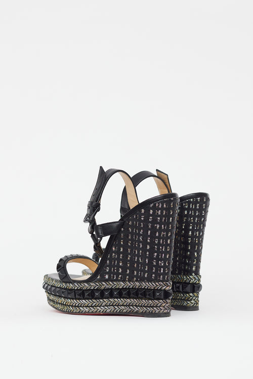 Christian Louboutin Black 
Gold Cataclou Studded Metallic Wedge Sandal