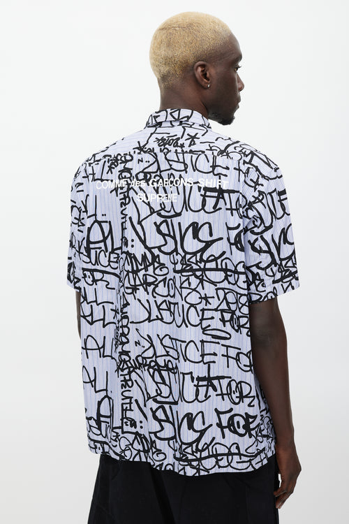 Comme des Garçons Blue 
Black Graffiti Logo Shirt