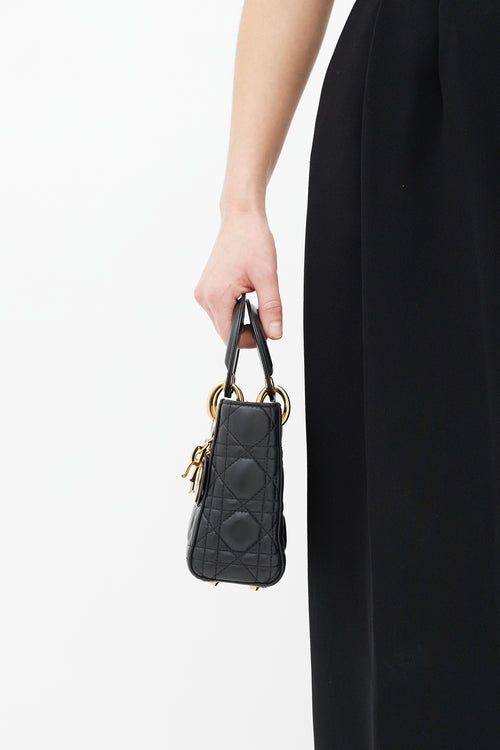 Dior Black 
Gold Mini Lady Dior Bag