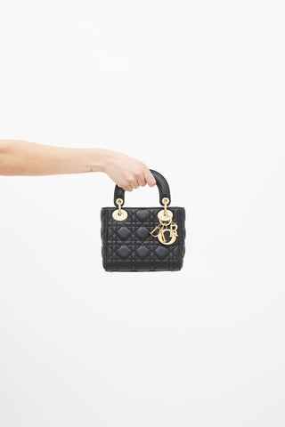 Dior Black 
Gold Mini Lady Dior Bag