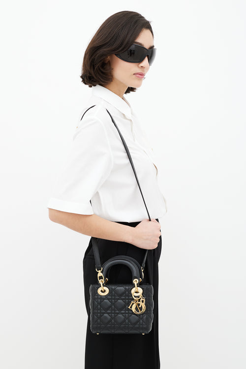 Dior Black 
Gold Mini Lady Dior Bag