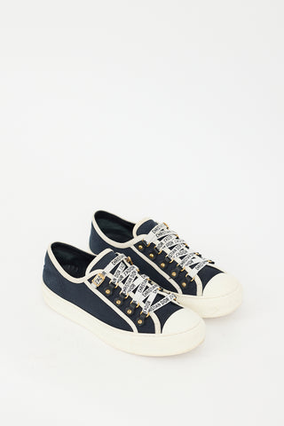 Dior Navy Walk
N
Dior Canvas Sneaker