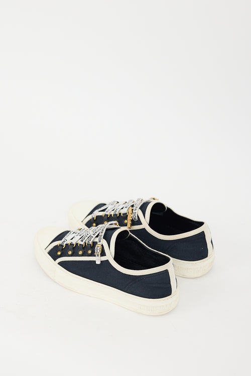 Dior Navy Walk
N
Dior Canvas Sneaker