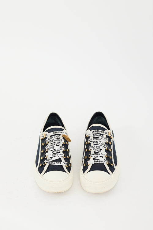 Dior Navy Walk
N
Dior Canvas Sneaker