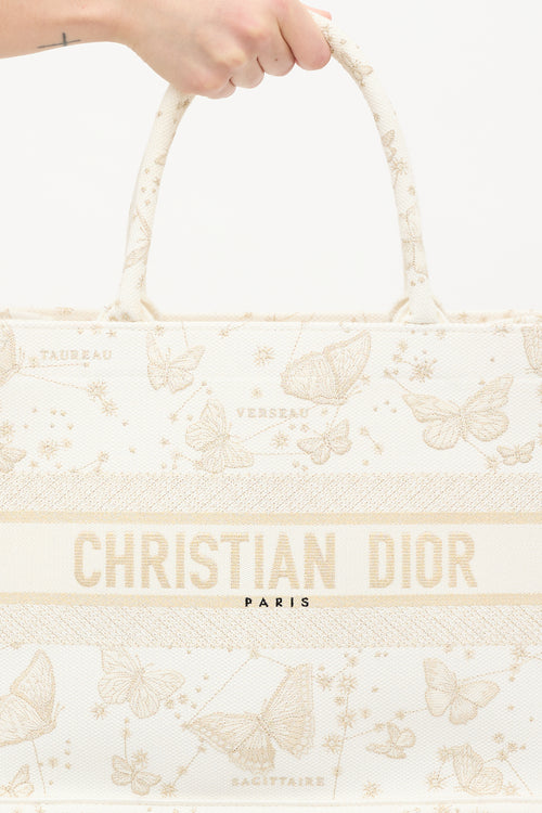 Dior White 
Gold Canvas Zodiac Embroidered Medium Book Tote Bag