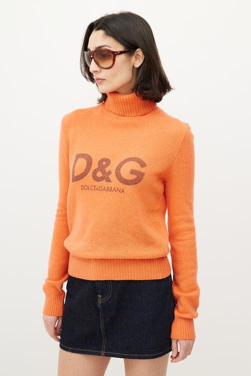 Dolce 
Gabbana D&G Orange Knit Logo Turtleneck Sweater