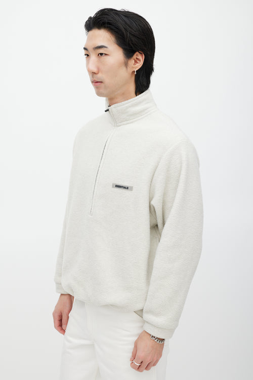 Essentials Cream 
Black Fleece Sweater