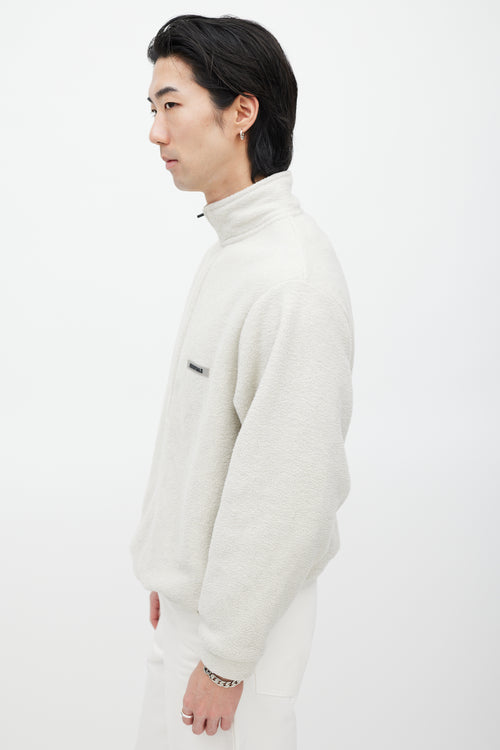 Essentials Cream 
Black Fleece Sweater