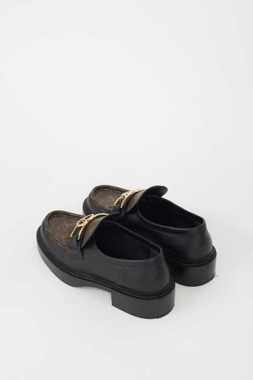 Louis Vuitton Black 
Brown Leather Academy Monogram Loafer