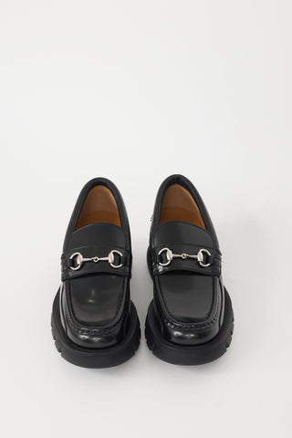 Gucci Black 
Silver Leather Romance Platform Loafer