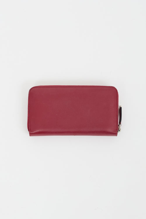 Fendi Red 
Multi Textured Monster Eyes Zip Wallet