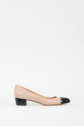 Ferragamo Beige 
Black Leather Embellished Cap Pump