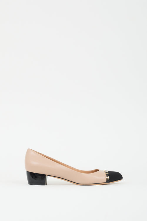 Ferragamo Beige 
Black Leather Embellished Cap Pump