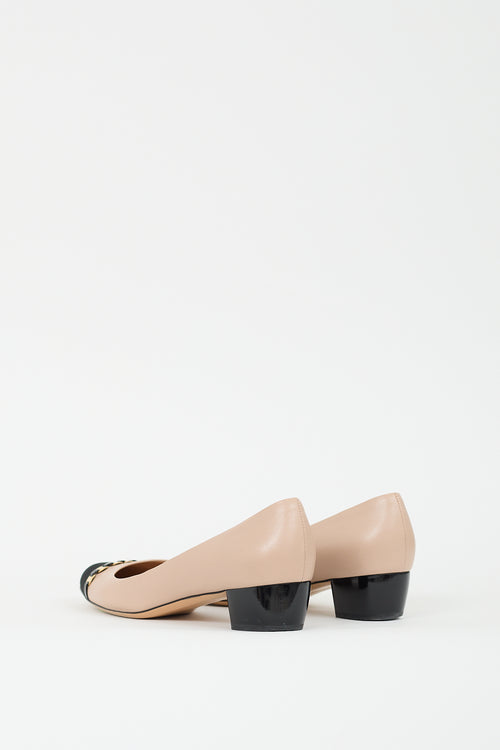 Ferragamo Beige 
Black Leather Embellished Cap Pump