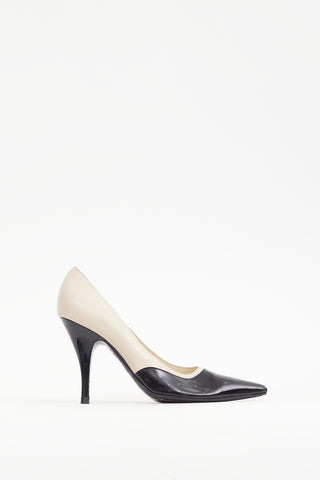 Ferragamo Black 
Cream Patent 
Leather Heel