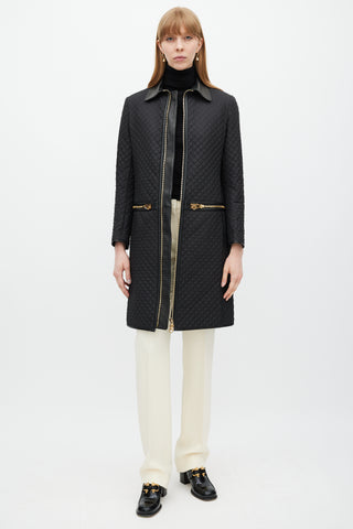 Ferragamo Black 
Gold Zip Quilted Coat