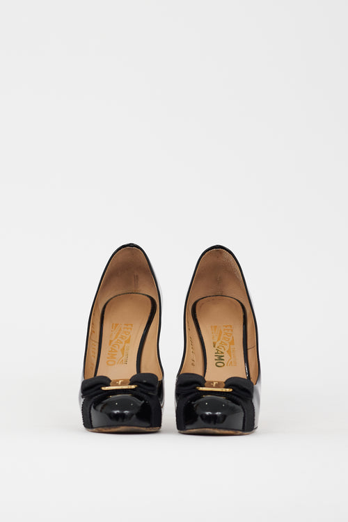 Ferragamo Black 
Gold Patent Leather Vara Bow Heel