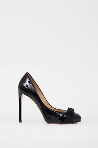 Ferragamo Black 
Gold Patent Leather Vara Bow Heel