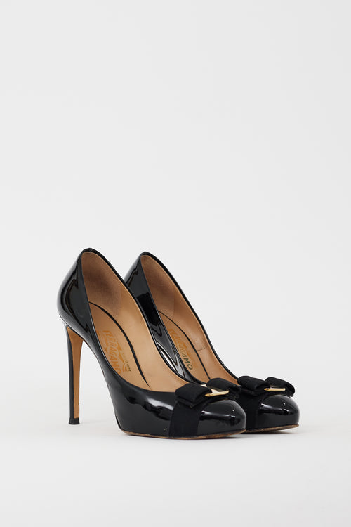 Ferragamo Black 
Gold Patent Leather Vara Bow Heel