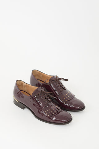 Ferragamo Burgundy Patent Leather Fringe Derby