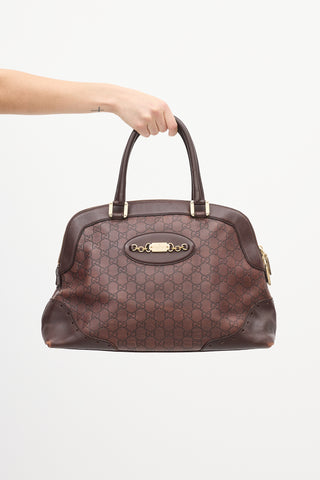 Gucci Brown Leather Monogram Embossed Bag