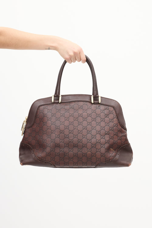 Gucci Brown Leather Monogram Embossed Bag